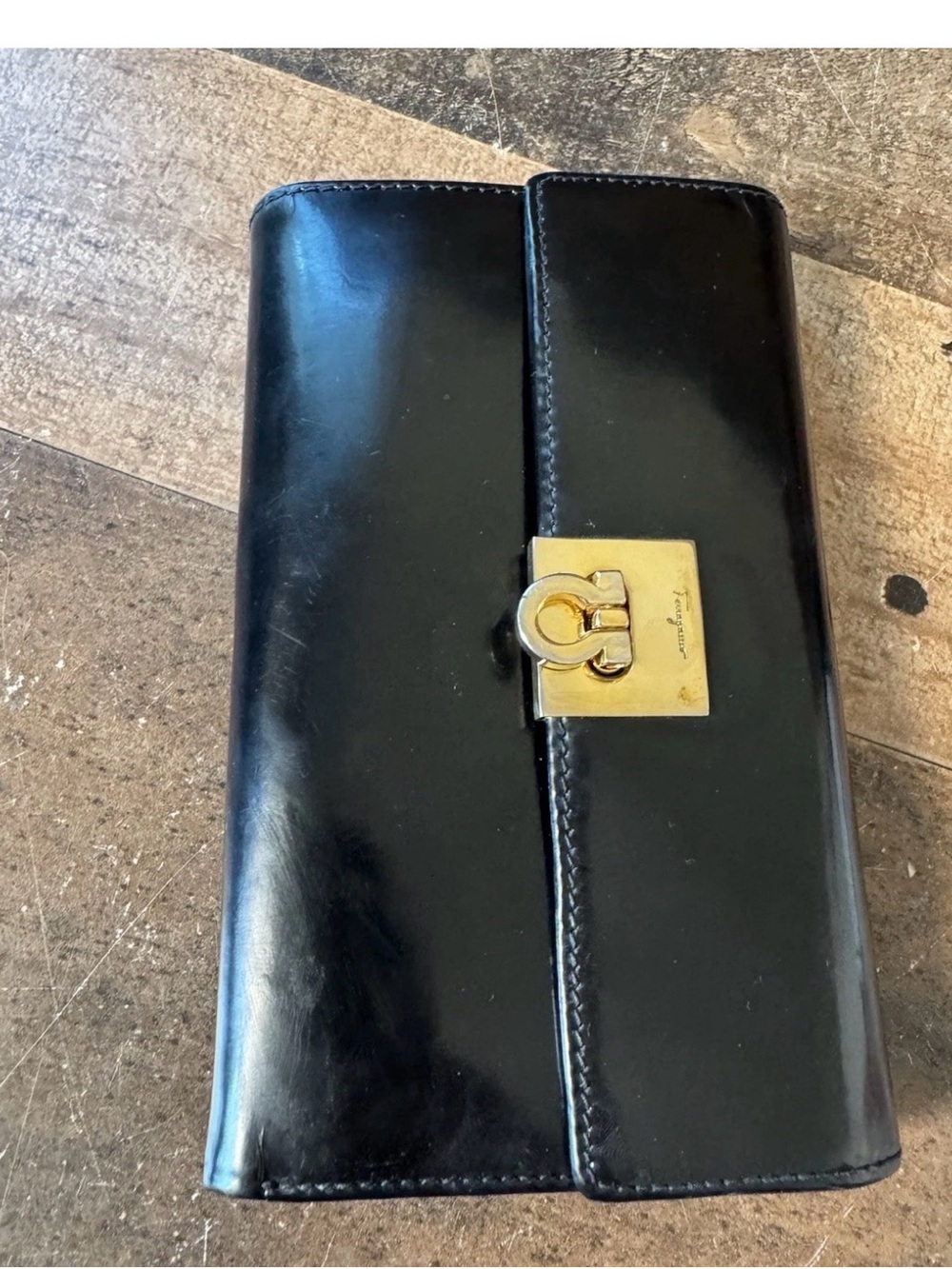 Salvatore Ferragamo Black Leather Clutch with Gold-Tone Gancini Lock